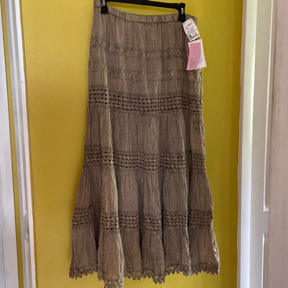 Greenish/gray women’s full length skirt.